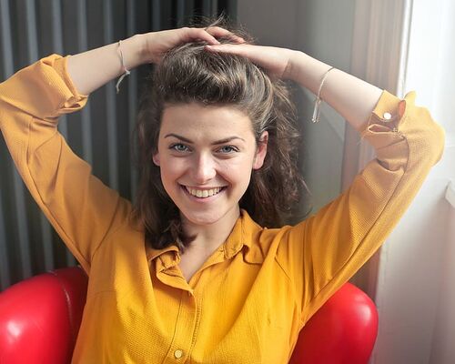 30-35-years-eye-contact-hair-up-happy