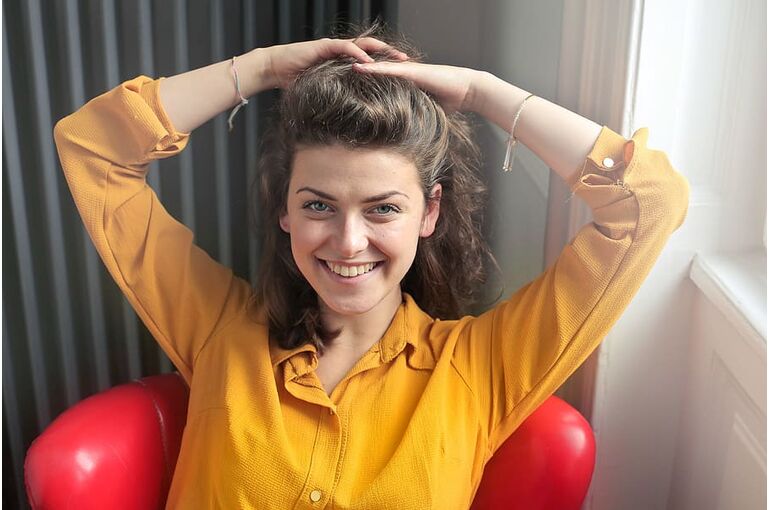 30-35-years-eye-contact-hair-up-happy